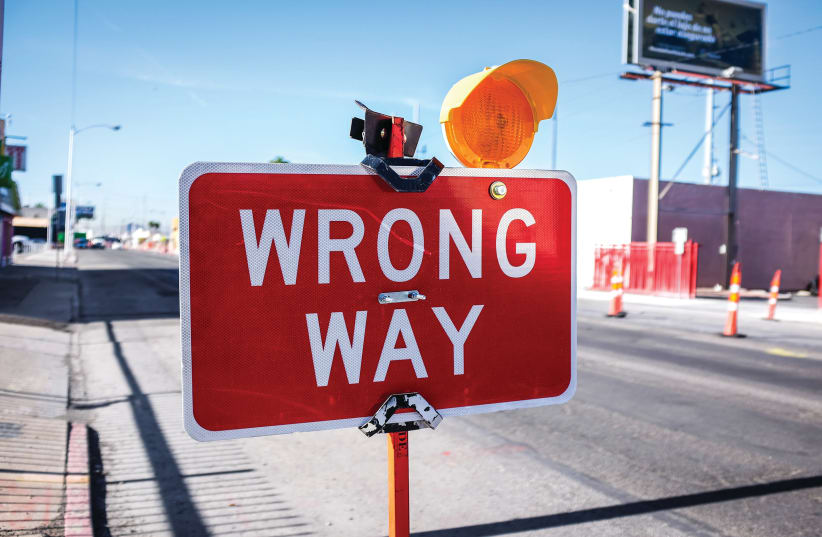  A "wrong way" sign (Illustrative) (photo credit: NeONBRAND/Unsplash)