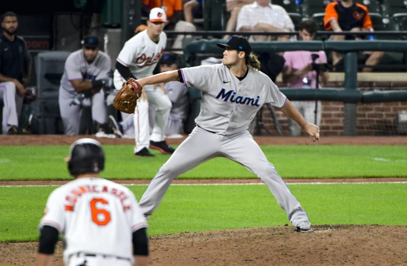 Baltimore, Maryland, USA; Miami Marlins relief pitcher Steven Okert (48) delivers a ninth inning pitch against the Baltimore Orioles at Oriole Park at Camden Yards (photo credit: TOMMY GILLIGAN-USA TODAY SPORTS)