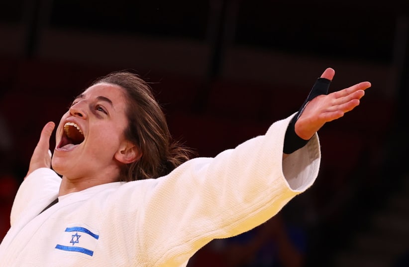 Timna Nelson Levy celebrating the bronze medal win after winning 4:2 against the ROC (photo credit: REUTERS/SERGIO PEREZ)