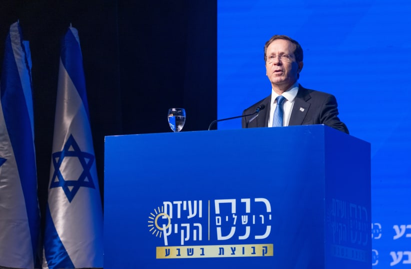 Israeli President Isaac Herzog speaks during a Conference of the 'Besheva' group in Jerusalem, on August 1, 2021 (photo credit: YONATAN SINDEL/FLASH 90)