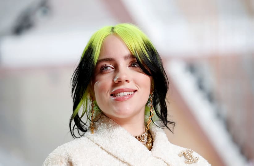 Billie Eilish in Chanel during the Oscars arrivals at the 92nd Academy Awards in Hollywood, Los Angeles, California, US, February 9, 2020. (photo credit: MIKE BLAKE/REUTERS)