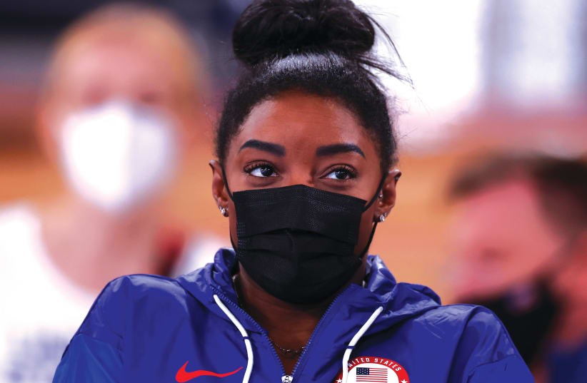 US GYMNAST Simone Biles during the floor exercise at the Tokyo 2020 Olympics yesterday.  (photo credit: MIKE BLAKE/ REUTERS)