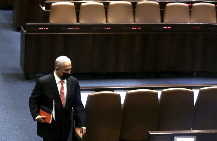 BENJAMIN NETANYAHU walks away from podium at Knesset, August 2, 2021 (photo credit: MARC ISRAEL SELLEM)