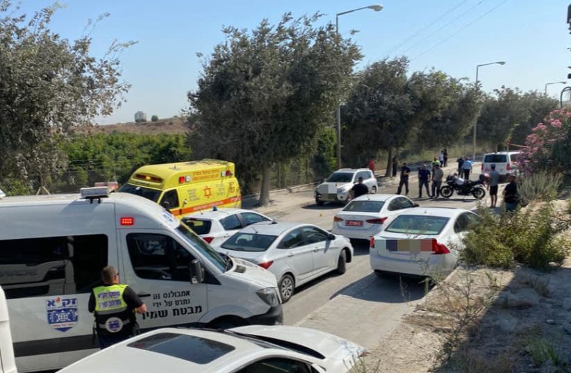 The scene where a biker was killed in a car crash near Rosh Ha'Ayin. (photo credit: ZAKA)