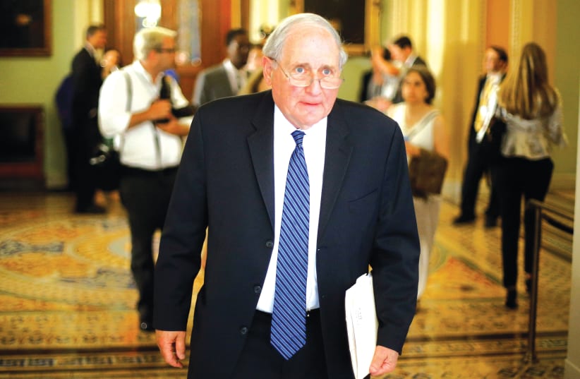  US SEN. Carl Levin departs a weekly Democratic Party caucus policy luncheon at the US Capitol in 2014. (photo credit: JONATHAN ERNST / REUTERS)