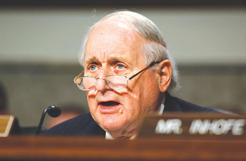 COMMITTEE CHAIRMAN Carl Levin leads a US Senate Armed Services Committee hearing in 2013. (photo credit: LARRY DOWNING/REUTERS)