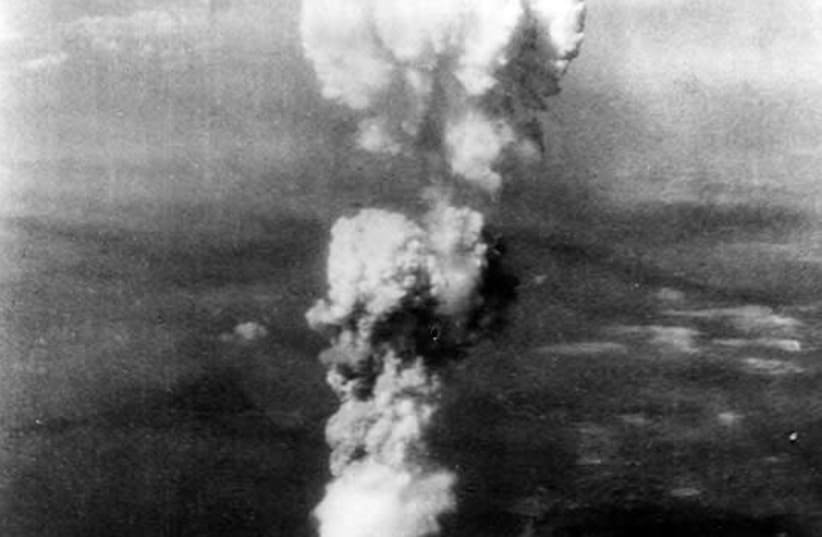 A mushroom cloud is seen following a nuclear bomb being dropped on Japan. (photo credit: FLICKR)