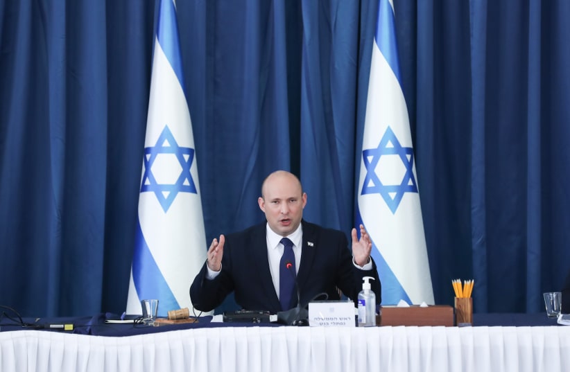 Israeli Prime Minister Naftali Bennett leads a cabinet meeting at the Prime Minister's Office in Jerusalem on August 8, 2021. (photo credit: OHAD TZVEIGENBERG‏/POOL)