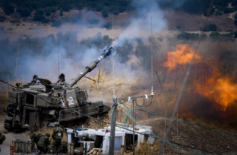  IDF (Israel Defense Force) Artillery Corps seen firing into Lebanon, near the Israeli border with Lebanon, on August 6, 2021.  (photo credit: BASEL AWIDAT/FLASH90)