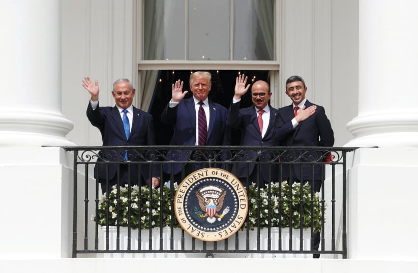  AL ZAYANI, NETANYAHU, Trump and bin Zayed participate in the signing of the Abraham Accords. (photo credit: TOM BRENNER/REUTERS)