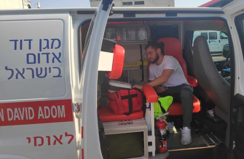 Young people from all around the world came to Israel this summer to volunteer with Magen David Adom teams, helping treat injured Israelis as first responders on ambulance teams.  (photo credit: Courtesy)
