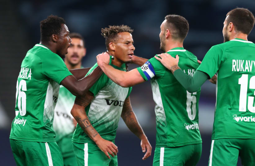  TJARRON CHERY (center) and Maccabi Haifa will look to continue their impressive early run in the the Conference league with a first-leg play-off round duel Neftchi Baku tonight in Azerbaijan. (photo credit: REUTERS)