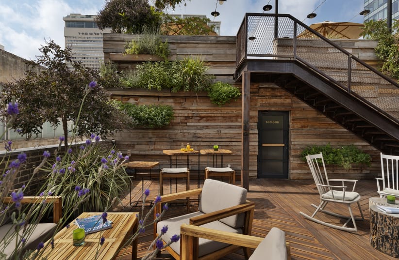  The Vera’s two-tier wooden rooftop deck. (photo credit: ASSAF PINCHUK)
