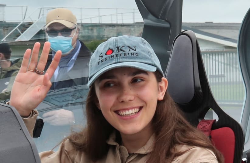  Belgian-British pilot Zara Rutherford, 19 poses for pictures before departing for a round-the-world trip in a light aircraft, aiming to become the youngest female pilot to circle the planet alone (photo credit: YVES HERMAN/REUTERS)