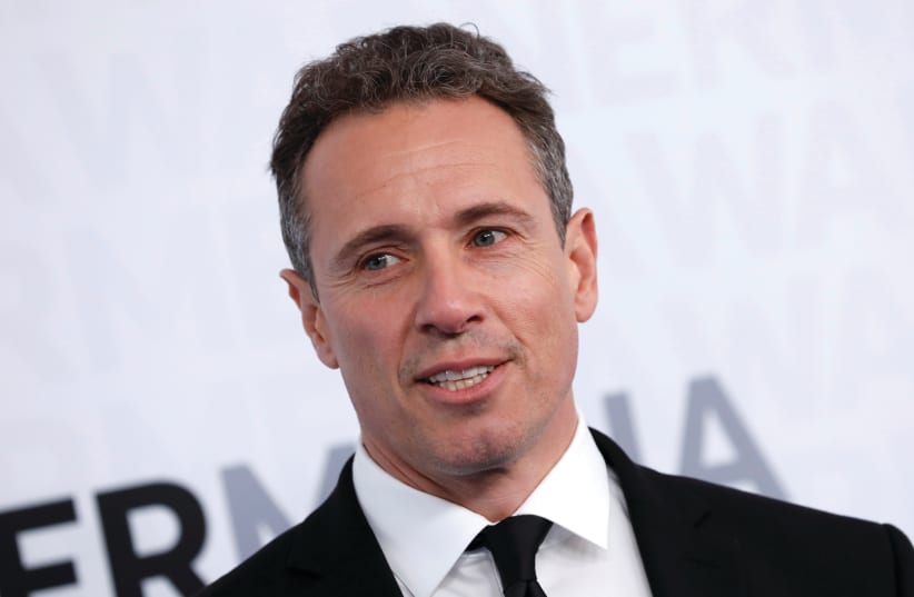 CNN NEWS ANCHOR Chris Cuomo poses as he arrives at a WarnerMedia Upfront event in New York City in May 2019.  (photo credit: MIKE SEGAR / REUTERS)