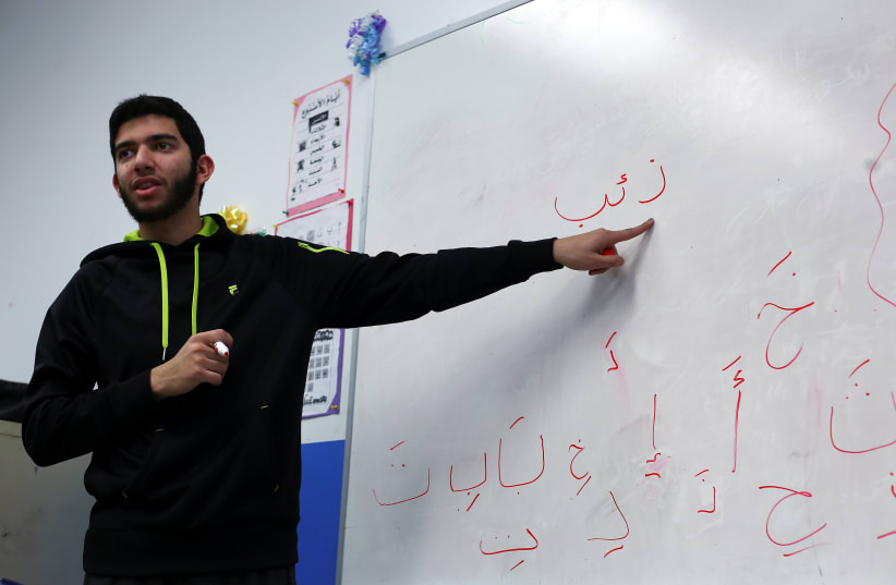  Teaching Arabic at Masjid Al-Salaam, a mosque and Islamic community center in Dearborn, Michigan (photo credit: Brittany Greeson/Reuters)