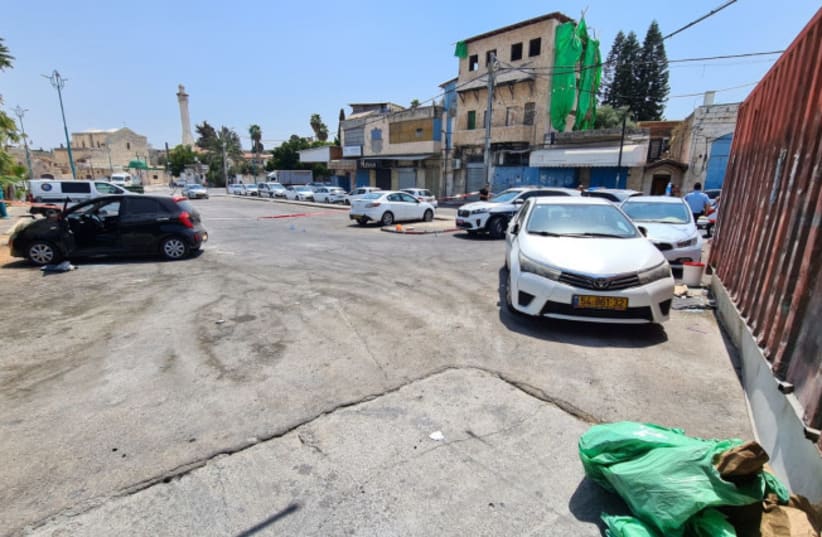 The scene of the shooting in Lod that killed 18-year-old Anas al-Wahwah on Saturday, August 28 2021. (photo credit: POLICE SPOKESPERSON'S UNIT)