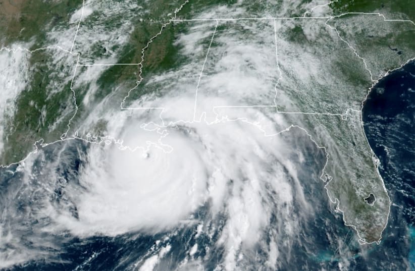  A satellite image shows Hurricane Ida in the Gulf of Mexico and approaching the coast of Louisiana, US, August 29, 2021. (photo credit: NOAA/HANDOUT VIA REUTERS)