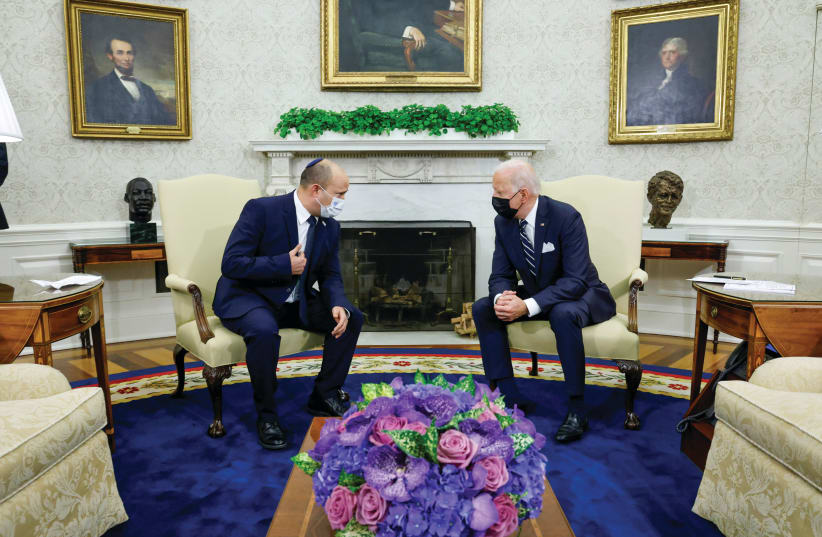  PRIME MINISTER Naftali Bennett and US President Joe Biden chat in the Oval Office last week. (photo credit: JONATHAN ERNST / REUTERS)