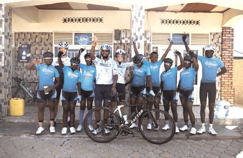  BUGESERA CYCLING TEAM members pose with ISN trainers. (photo credit: Courtesy)