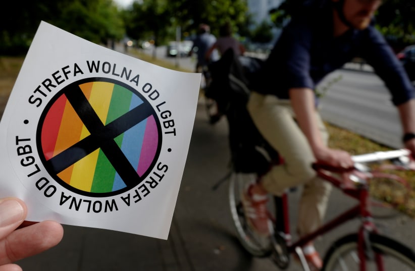  A sticker with words "LGBT-free zone" distributed in weekly conservative magazine "Gazeta Polska" is pictured in Warsaw, Poland July 24, 2019. (photo credit: KACPER PEMPEL/REUTERS)