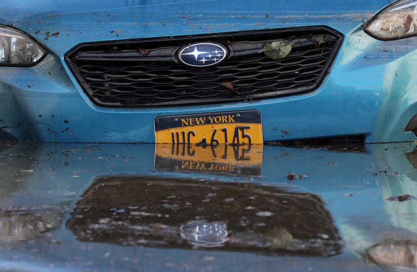  A flooded car is pictured after the remnants of Ida brought flash floods in Mamaroneck, New York (photo credit: REUTERS)