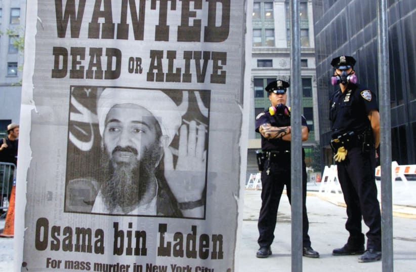  WANTED: SEEKING Osama bin Laden  in the New York financial district,  September 18, 2001. (photo credit: REUTERS/RUSSELL BOYCE)