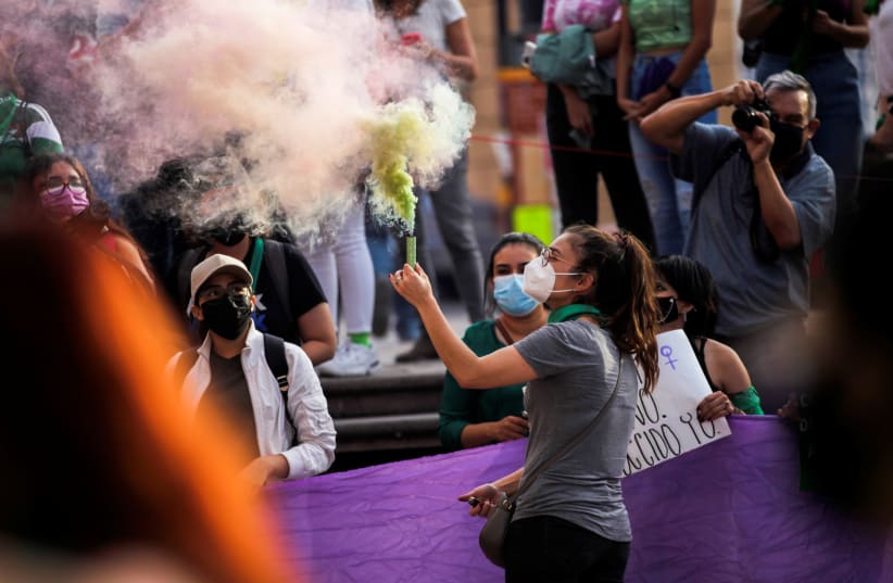  A woman takes part in a protest to celebrate the decision of the Supreme Court of Justice of the Nation (SCJN) that declared the criminalization of abortion as unconstitutional, in Saltillo, Mexico September 7, 2021.  (photo credit: REUTERS/DANIEL BECERRIL)