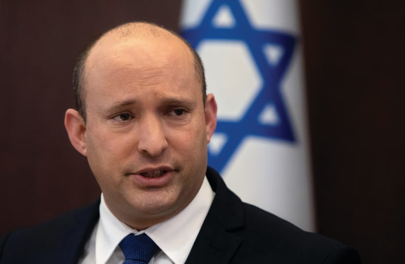  PRIME MINISTER Naftali Bennett leads a cabinet meeting this week. If things go according to plan, he has all of 5782 ahead of him as Israel’s leader. (photo credit: SEBASTIAN SCHEINER/POOL VIA REUTERS)