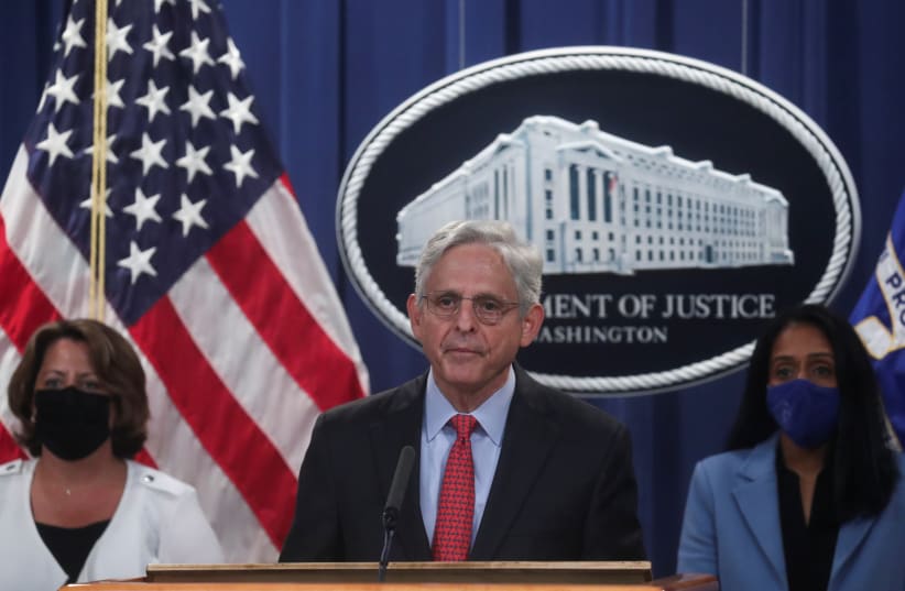  U.S. Attorney General Merrick Garland, accompanied by Deputy Attorney General Lisa Monaco and Associate Attorney General Vanita Gupta, announces a civil lawsuit to sue Texas over its abortion law, during a news conference at the Justice Department in Washington, D.C., U.S., September 9, 2021. (photo credit: REUTERS/LEAH MILLIS)