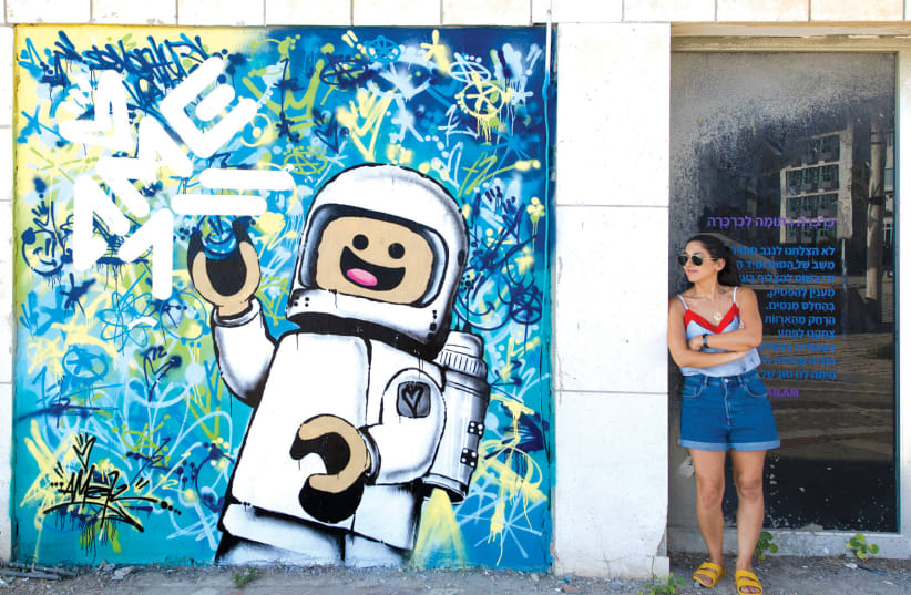  Spaceman by Ame72. Tel Aviv street art is energetic. (photo credit: Lord K2)