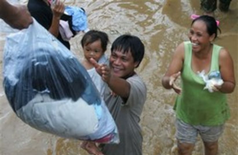 flood philipines 248.88 (photo credit: AP)