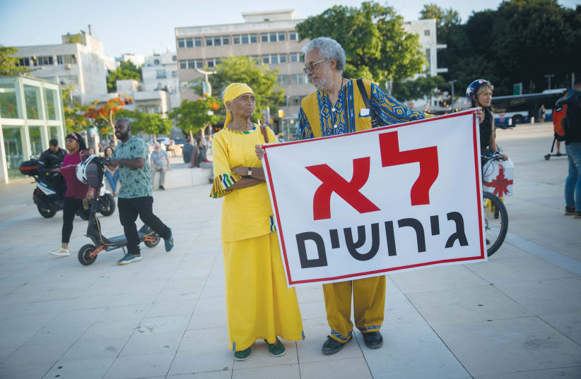  MEMBERS OF THE Black Hebrews community protest against deportation orders, at Habima Square in Tel Aviv, in June. (photo credit: MIRIAM ALSTER/FLASH90)