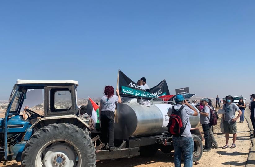  Activists from the left-wing organizations Combatants for Peace, All That's Left and the Jordan Valley Coalition in the South Hebron Hills (photo credit: COMBATANTS FOR PEACE)