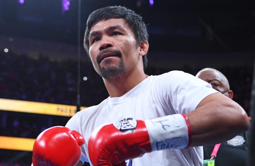  Manny Pacquiao is pictured before the start of a world welterweight championship bout against Yordenis Ugas at T-Mobile Arena. Aug 21, 2021; Las Vegas, Nevada (photo credit: STEPHEN R. SYLVANIE/USA TODAY SPORTS)