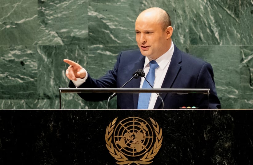  Israel’s prime minister Naftali Bennett addresses the 76th Session of the United Nations General Assembly, at the UN headquarters in New York, US, September 27, 2021 (photo credit: JOHN MINCHILLO /POOL VIA REUTERS)