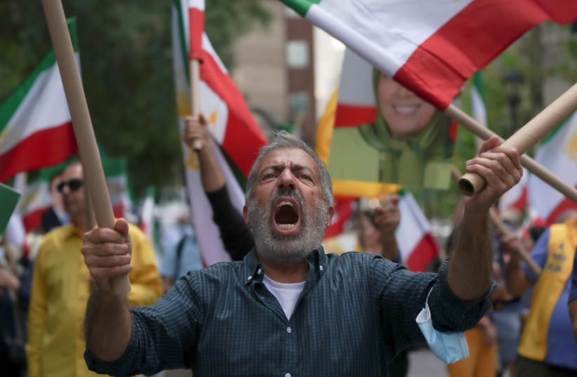  Iranian Americans rally against Ebrahim Raisi outside the United Nations headquarters during the 76th Session of the U.N. General Assembly, in New York, US, September 21, 2021. (photo credit: REUTERS/DAVID 'DEE' DELGADO)