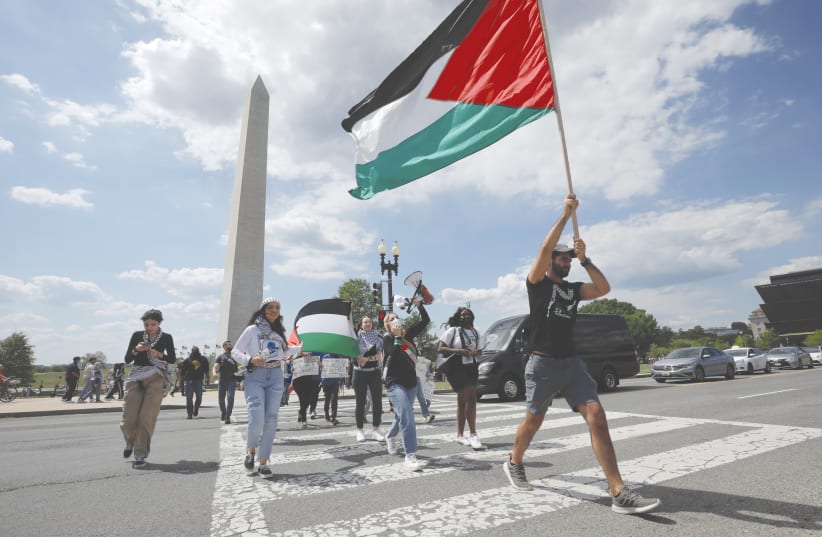  PRO-PALESTINIAN demonstrators protest at the Washington Monument earlier this year. (photo credit: YURI GRIPAS/REUTERS)