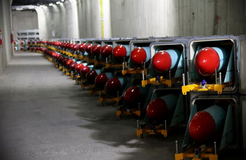  Iranian missiles are seen at an underground of the new "missile cite" of Iran's Revolutionary Guards naval unit at an undisclosed location in Iran, in this picture obtained on March 15, 2021. (photo credit: IRGC/WANA/HANDOUT VIA REUTERS)