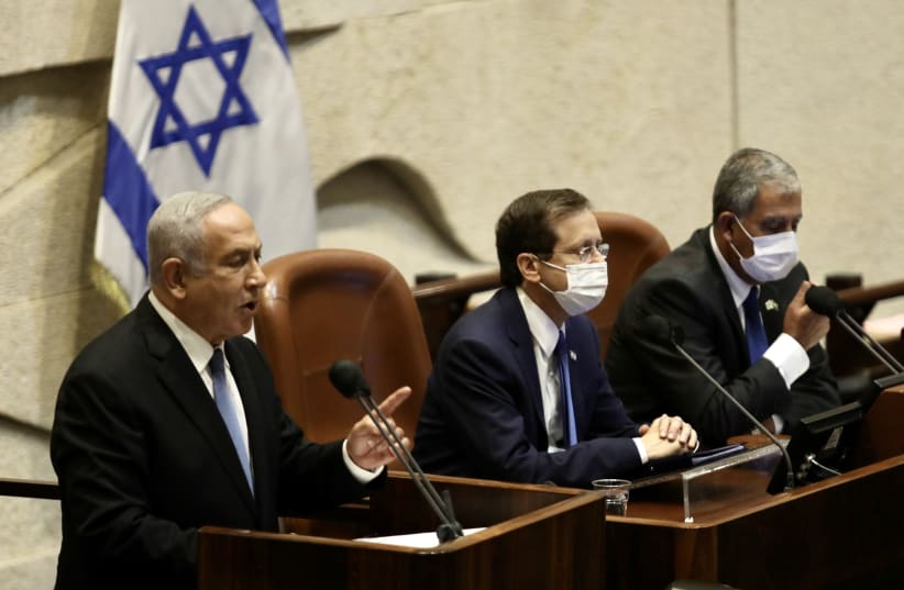  Prime Minister Benjamin Netanyahu at the Knesset plenum, October 4, 2021. (photo credit: MARC ISRAEL SELLEM/THE JERUSALEM POST)