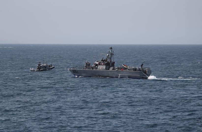  Israeli navy boats are seen in the Mediterranean Sea as seen from Rosh Hanikra, close to the Lebanese border, northern Israel May 4, 2021. (photo credit: REUTERS/AMMAR AWAD)