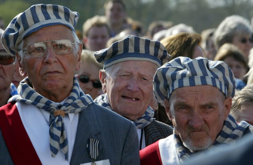 Survivors of the Nazi regime attend a memorial service at the former Nazi concentration camp in Sachsenhausen near the German capital Berlin April 17, 2005.  (photo credit: TOBIAS SCHWARZ / REUTERS)