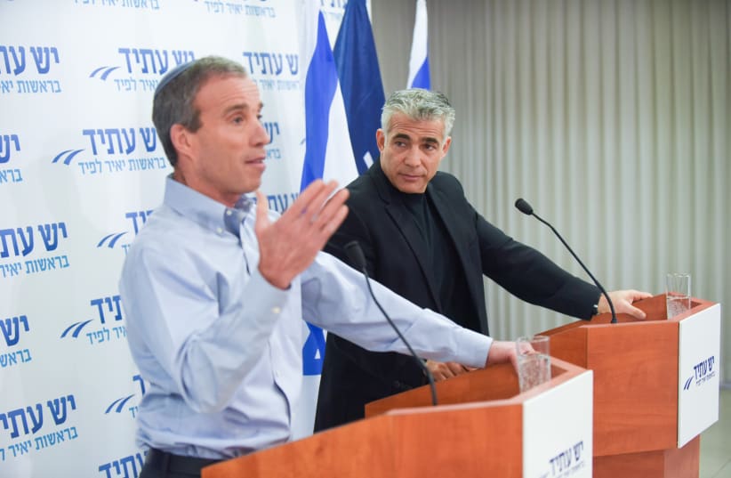  Leader of the "Yesh Atid" political party Yair Lapid (R) seen with MK Elazar Stern at a press conference in Tel Aviv,  on January 18, 2015 (photo credit: Ben Kelmer/FLASH90)