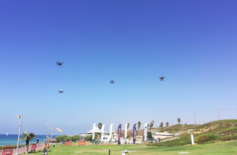  A drone delivers sushi to waiting recipients in the Tel Aviv area, October 11, 2021. (photo credit: ZEV STUB)