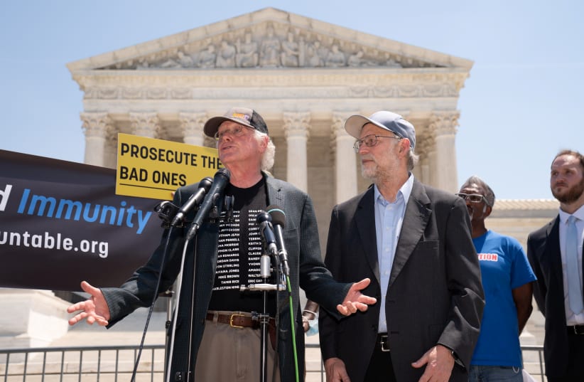  Ben Cohen and Jerry Greenfield, of Ben and Jerry's Ice Cream, speak at Campaign to End Qualified Immunity in front of the Supreme Court in Washington, U.S., May 20, 2021. (photo credit: REUTERS/KEN CEDENO)