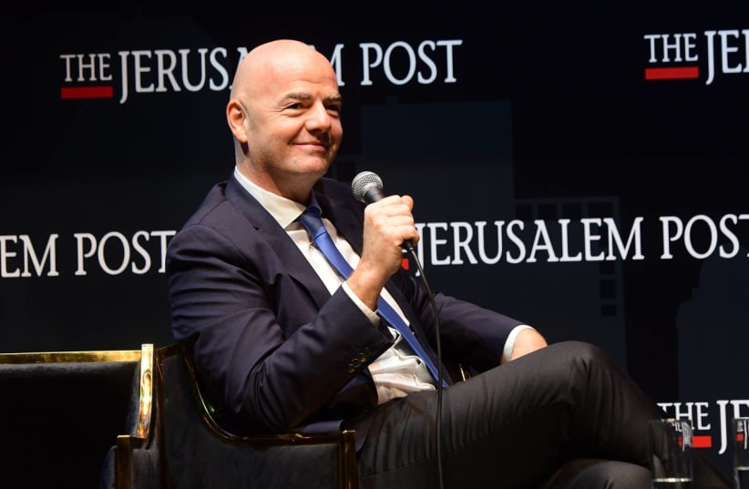   FIFA president Gianni Infantino is seen speaking at the Jerusalem Post annual conference at the Museum of Tolerance in Jerusalem, on October 12, 2021. (photo credit: AVSHALOM SASSONI/MAARIV)