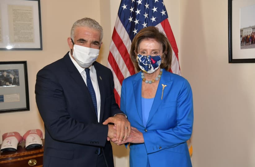  FOREIGN MINISTER Yair Lapid visits US Speaker of the House Nancy Pelosi, October 12, 2021 (photo credit: OZ AVITAL/GOVERNMENT PRESS OFFICE)