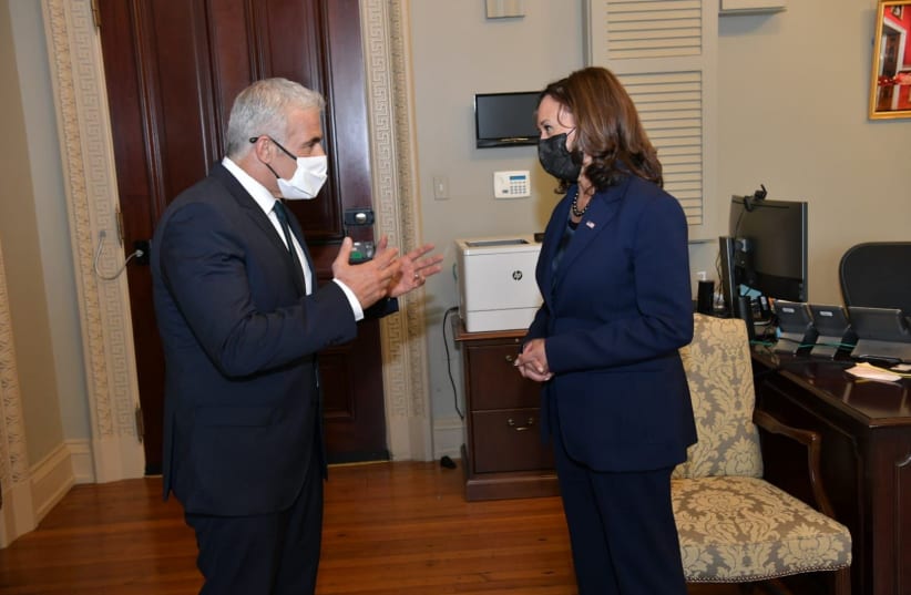  Yair Lapid and Kamala Harris meet in Washington, October 13, 2021. (photo credit: OZ AVITAL/GOVERNMENT PRESS OFFICE)