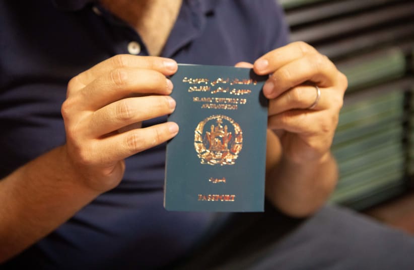  Afghan passport. (photo credit: ETHAN SCHWARTZ (ISRAAID))