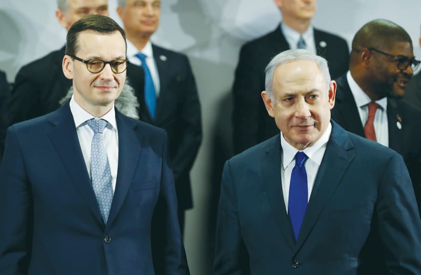  THEN-PRIME MINISTER Benjamin Netanyahu and Polish Prime Minister Mateusz Morawiecki at a Middle East summit in Warsaw in 2019.  (photo credit: KACPER PEMPEL/REUTERS)